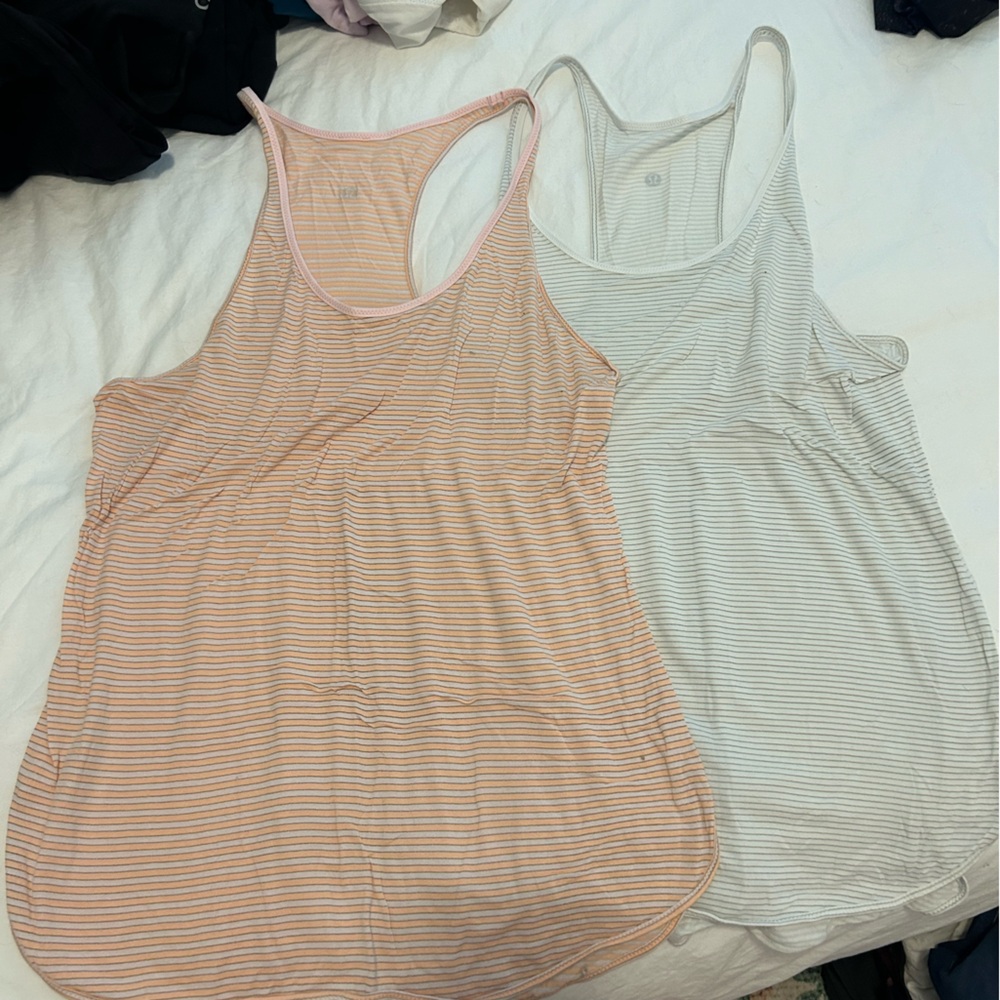 Set of two lululemon tanks white and pink sz 10